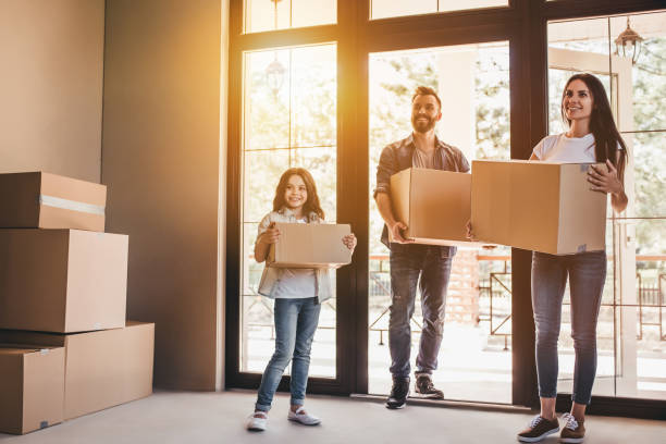 istock Family moving in new house 997714268