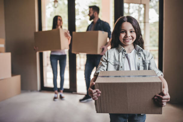 istock Family moving in new house 997714280