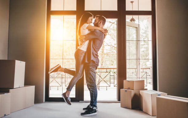 istock Couple moving in new house 997714326