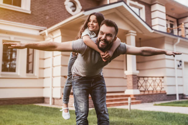 istock Dad with daughter outdoors 997714744