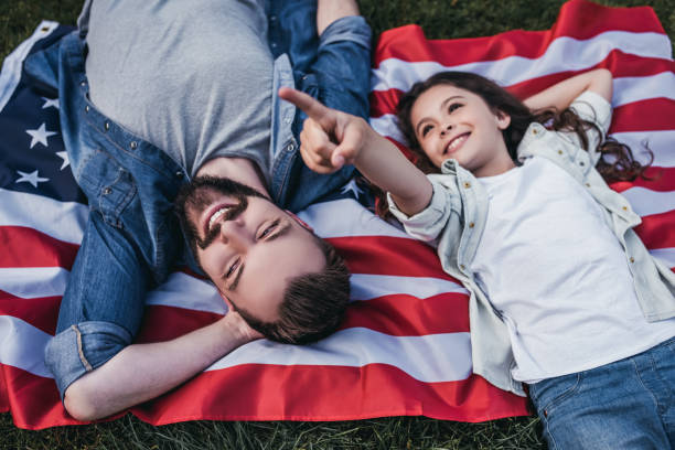 istock Dad with daughter outdoors 997715328