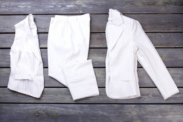 istock White striped women's business clothes. 997721256