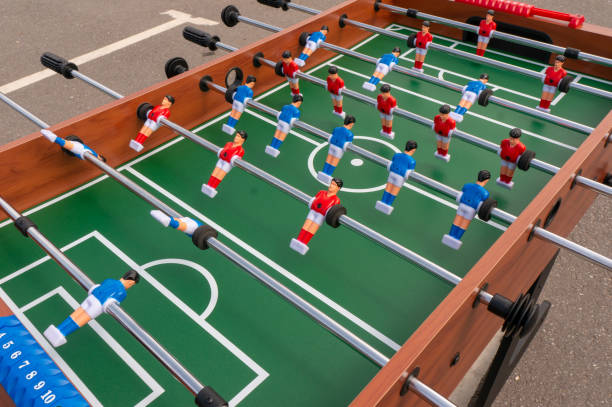 istock Table football game, Soccer table with red and blue players 997723896