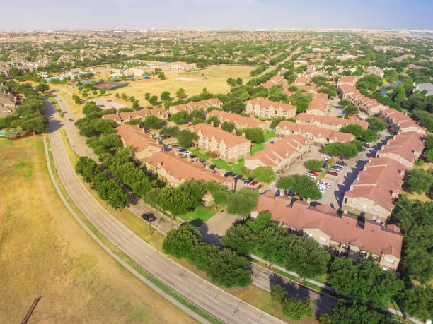 istock Aerial view park side apartment buildings complex in Irving, Texas, USA 997736998