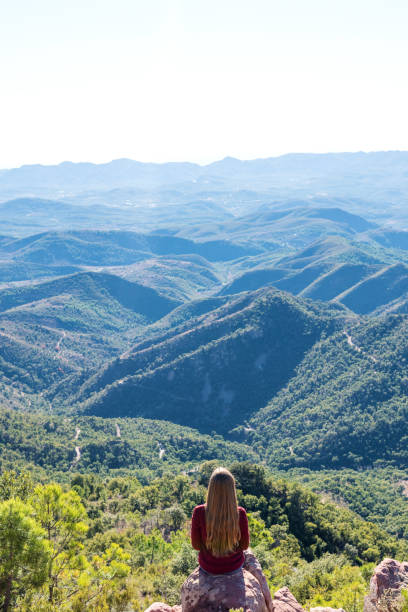 istock Woman looking at mountains 997743698