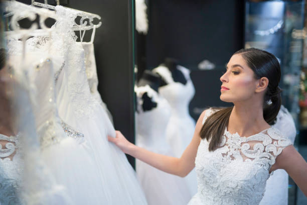 istock Bride unsatisfied with the choice of dresses 997745578
