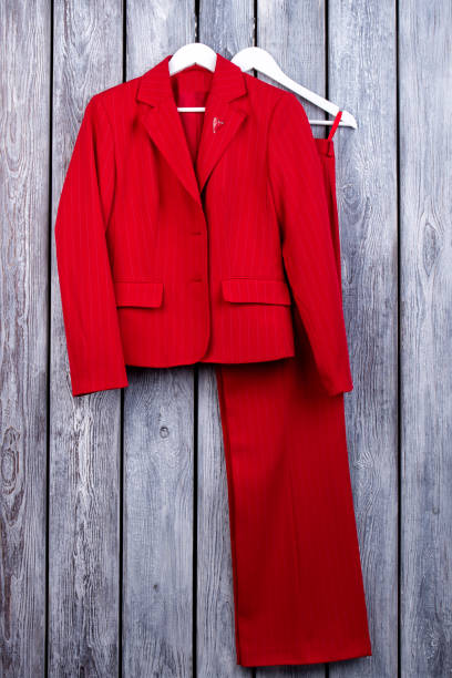 istock Red women's suit with trousers. 997754494