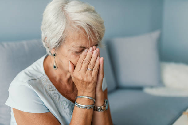 istock A solemn elderly woman sitting on her bed dealing with depression 997761960