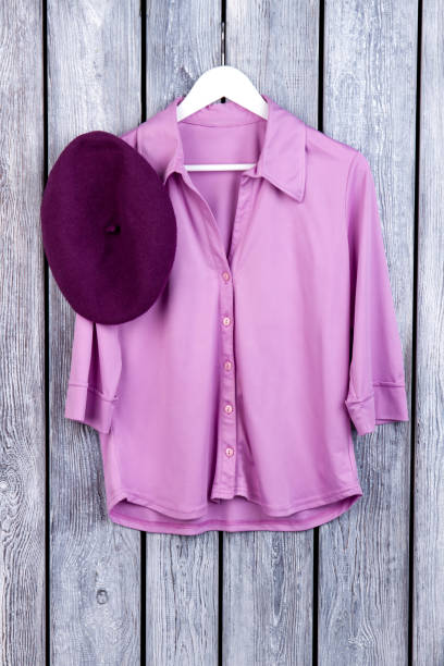 istock Purple outfit, shirt and hat. 997779216