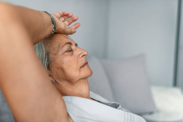 istock Middle aged woman relaxing at home 997784456