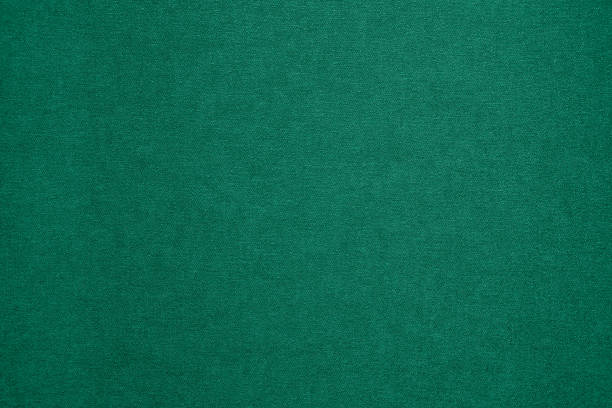 istock Textured dark green artistic grainy background 997784748