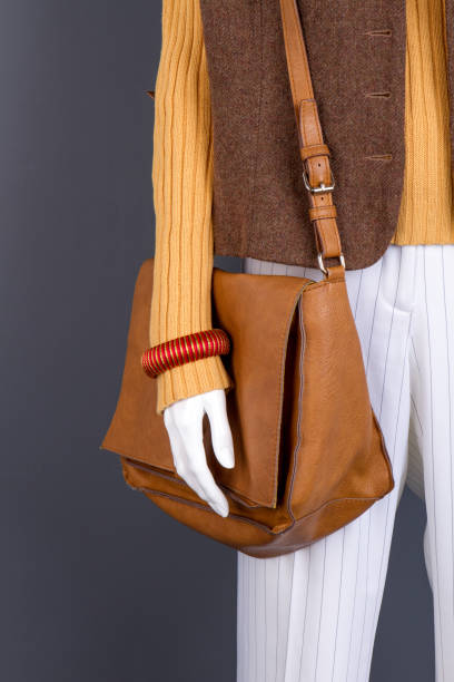 istock Close up brown leather handbag on mannequin. 997786854