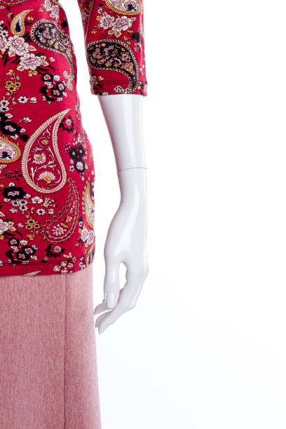 istock Close up mannequin hand, red stylish clothes. 997791082
