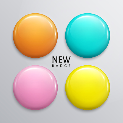Blank glossy badges, pin or web button. Four pastel colors, yellow, orange, turquoise and purple.