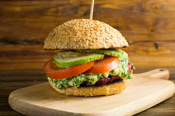 istock Veggie Burger with beet Patty, zucchini and pesto sauce 997834222