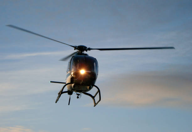 istock Helicopter flying in the sky 997835378