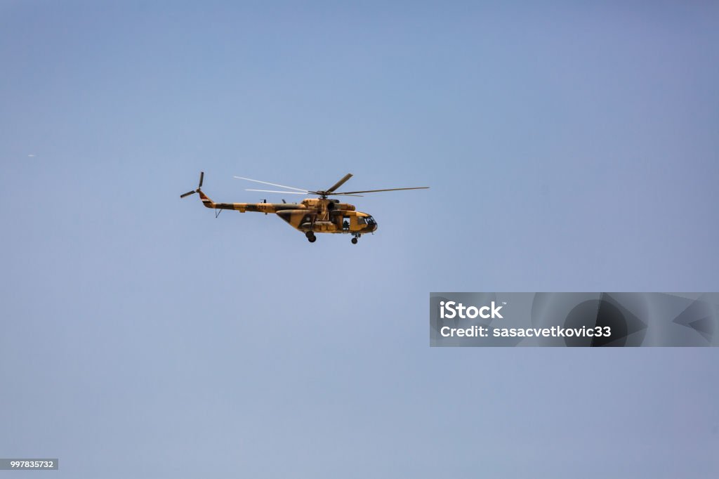 Military gunships flying Military Helicopter, Helicopter, Air Vehicle, Airplane, Attack Helicopter Helicopter Stock Photo