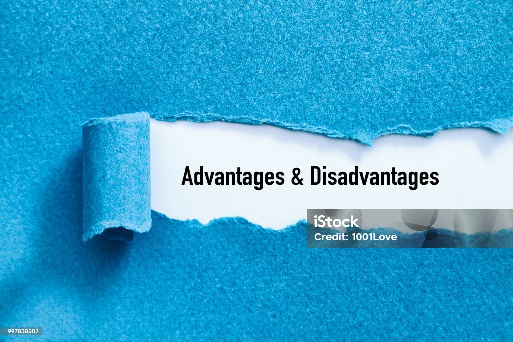Advantages and Disadvantages Advantages and Disadvantages written under torn paper. 2018 Stock Photo