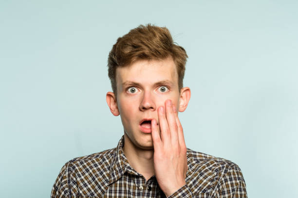 istock omg unbelievable shock man open mouth emotion 997838850
