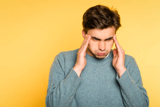 istock focused frowning man thinking blow mind emotion 997840114