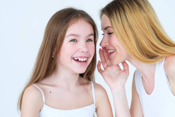 istock secret family trust relationship mother whisper 997853888