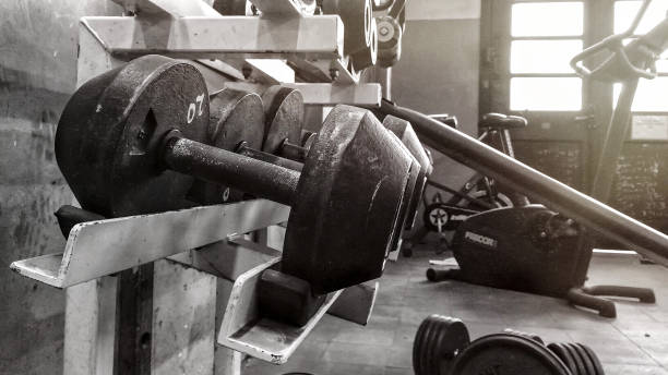 istock Dumbbells on Rack in Gym 997876700