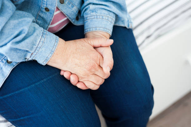 istock Close-up of an elderly woman's hand joined together 997877300