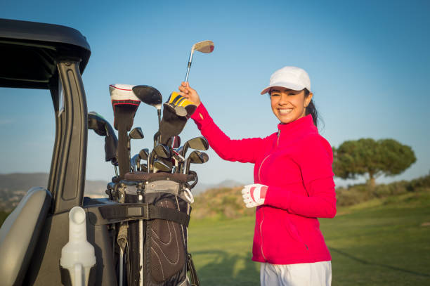 istock Hispanic Women Golfer Getting A Club 997883304