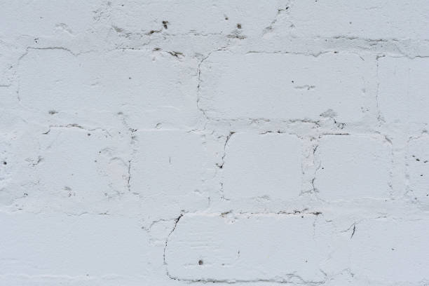 istock Wall fragment with scratches and cracks 997890452