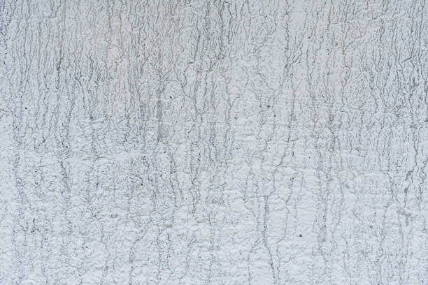 istock Wall fragment with scratches and cracks 997890472