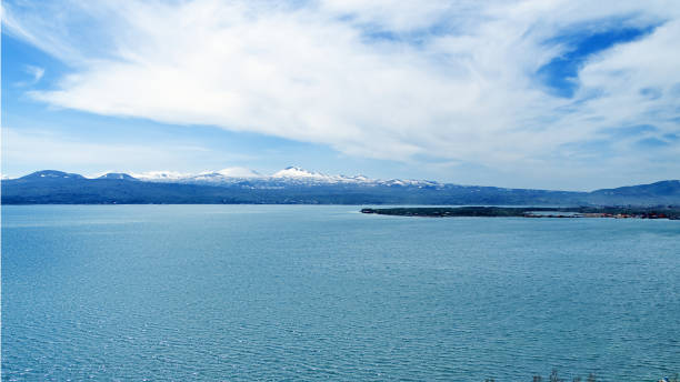 istock Lake Sevan in Armenia, beautiful view of lake on a sunny bright spring day, beautiful clouds 997891578