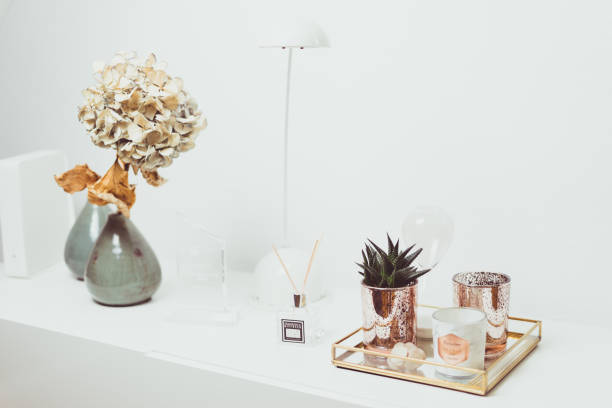 istock Shelf with cactus candle flower light and other decoration 997894864