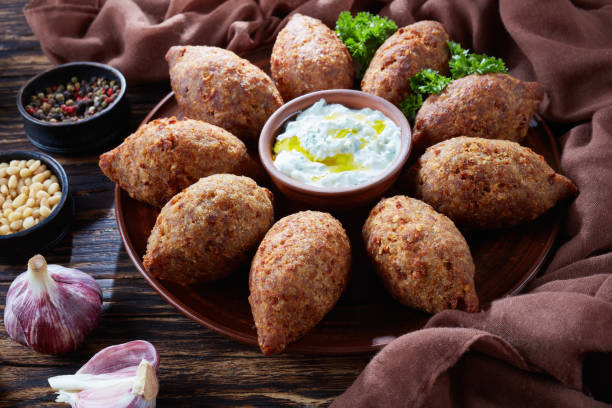 istock fried kibbeh of ground beef meat mixed with bulgur 997895612
