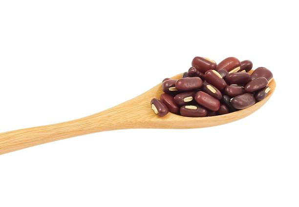 istock Kidney Beans in Wooden Spoon on White Background 997899414