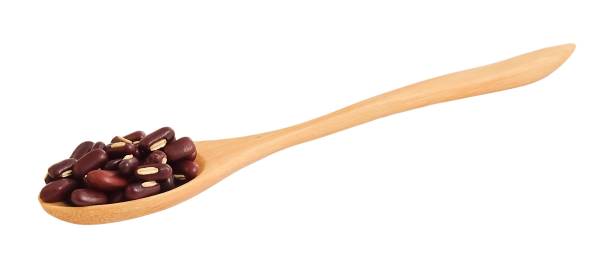 istock Kidney Beans in Wooden Spoon on White Background 997899426