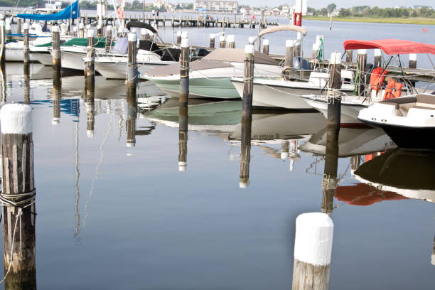 istock Small boats docked at marina 997899912