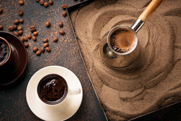 istock Traditional turkish coffee prepared on hot sand 997952818