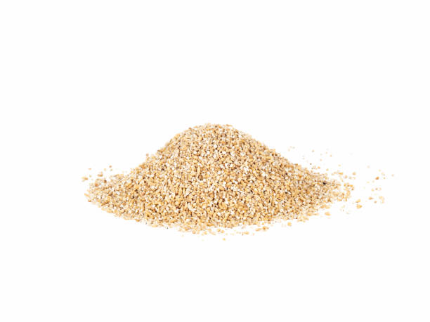 istock Isolated pile of grains 997955984