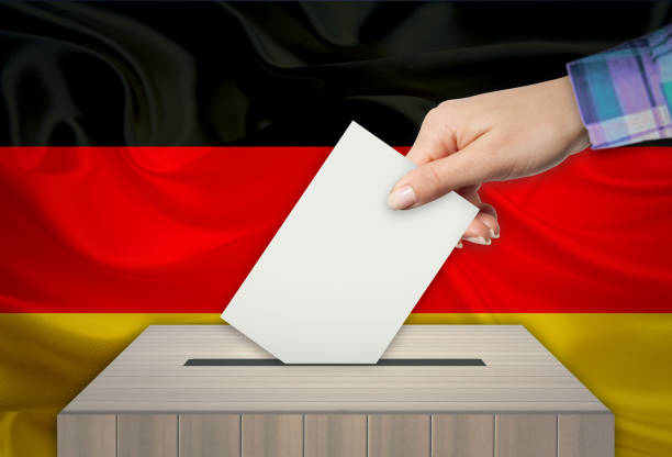 istock Ballot box with national flag on background- GERMANY 997965114