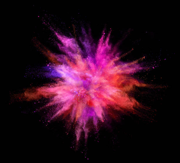 istock Explosion of coloured powder on black background 997968616