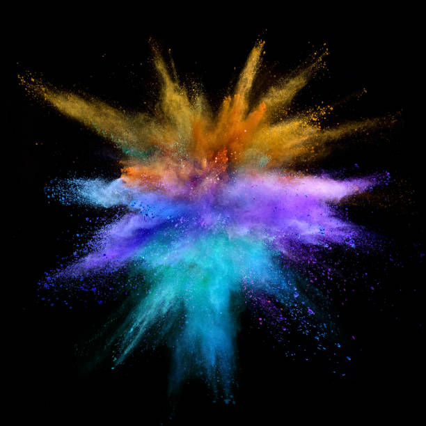istock Explosion of coloured powder on black background 997968712