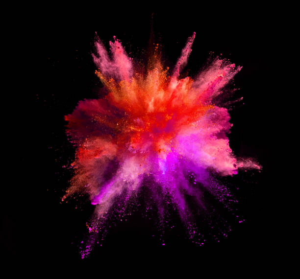 istock Explosion of coloured powder on black background 997968846