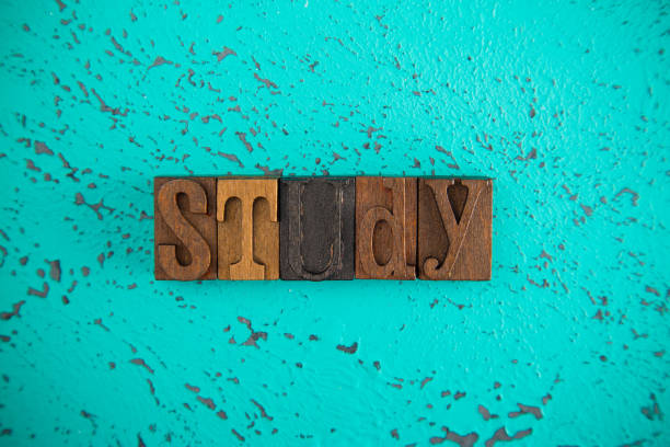 istock Study Spelled in Wooden Type Set Block Letters 997991460
