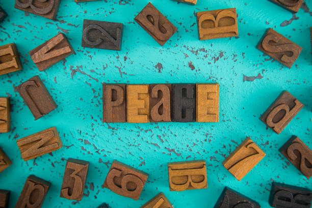 istock Peace Spelled in Wooden Type Set Block Letters 997991652