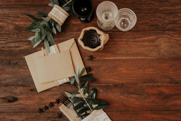 istock Rustic invitation card on wooden background. Wedding concept 998005518