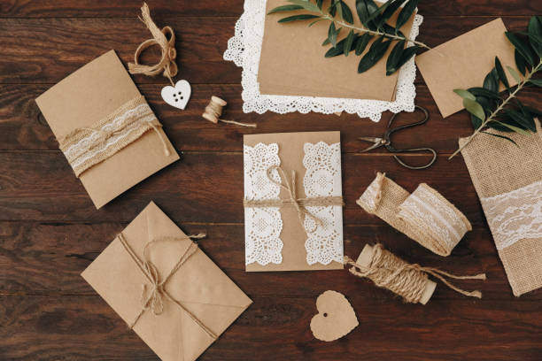 istock Diy creative idea. Handmade card invitation. Wedding card invitation. Flat lay, wooden background 998005534