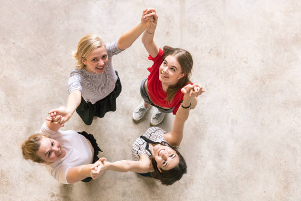 istock Top view of Young women standing together 998008608