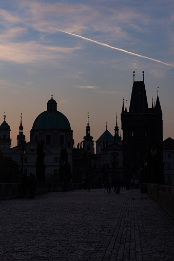 sunrise on Charles Bridge and silhouette of sculptures