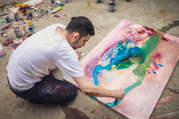 istock Man Making Art Outdoors 998024824