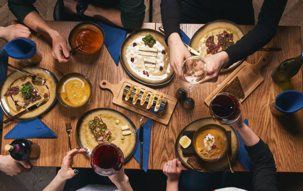 istock Happy company having lunch, top view 998028698